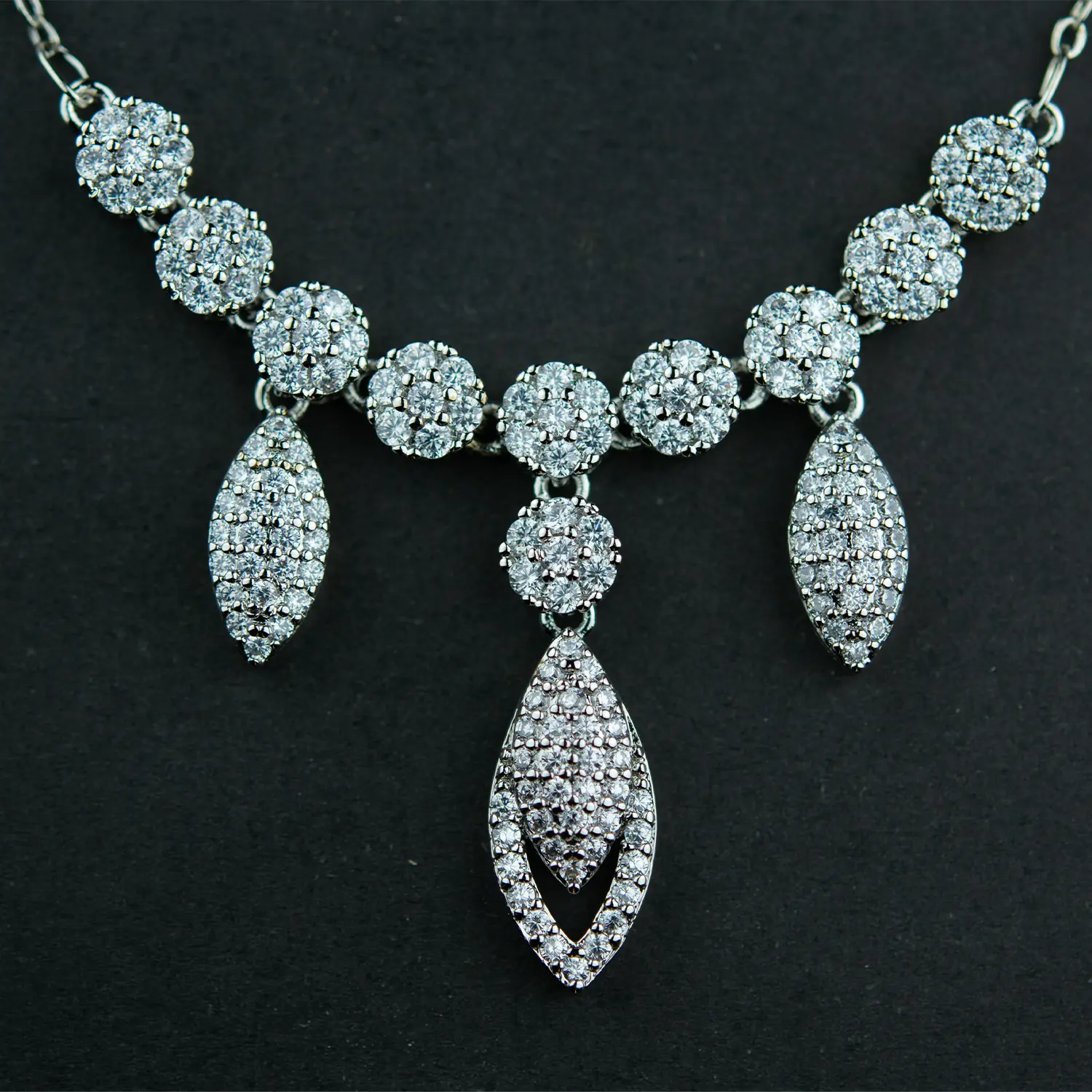 floral zirconia earrings and pendant set