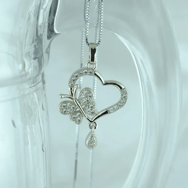 Heart-shaped butterfly pendant in silver finish